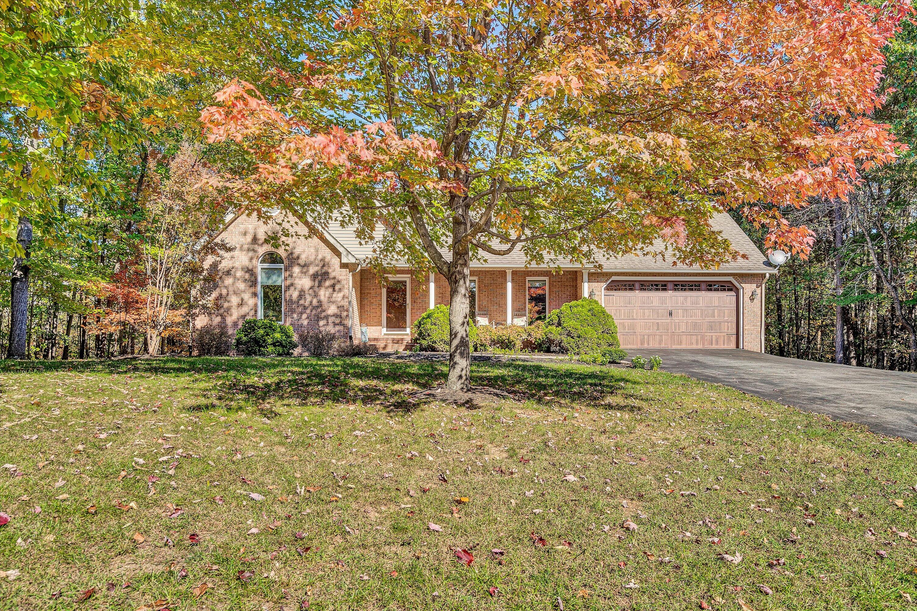 526 Stonebridge Drive Blue Ridge, VA 24064 - Photo 1 of 35 a view of a house with a yard