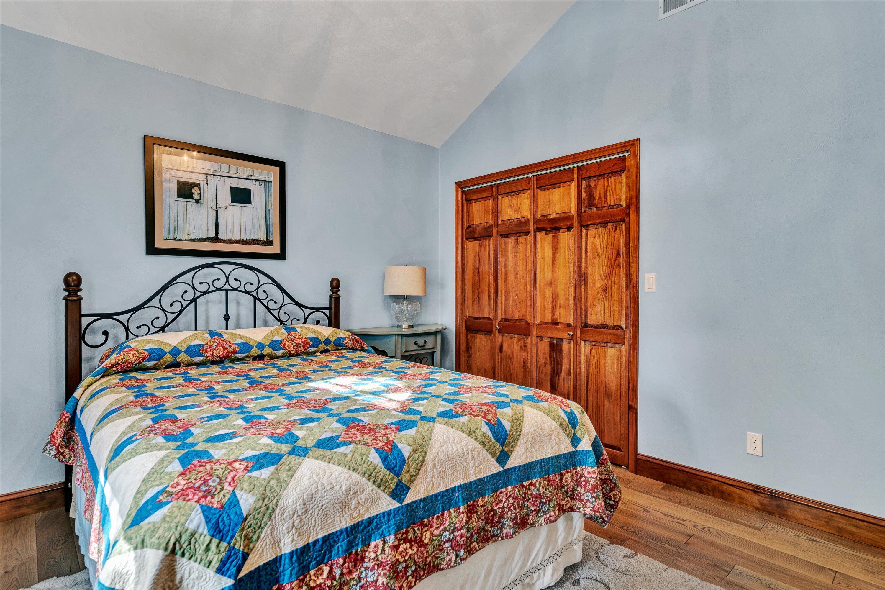 526 Stonebridge Drive Blue Ridge, VA 24064 - Photo 28 of 35 a bedroom with a bed and a window