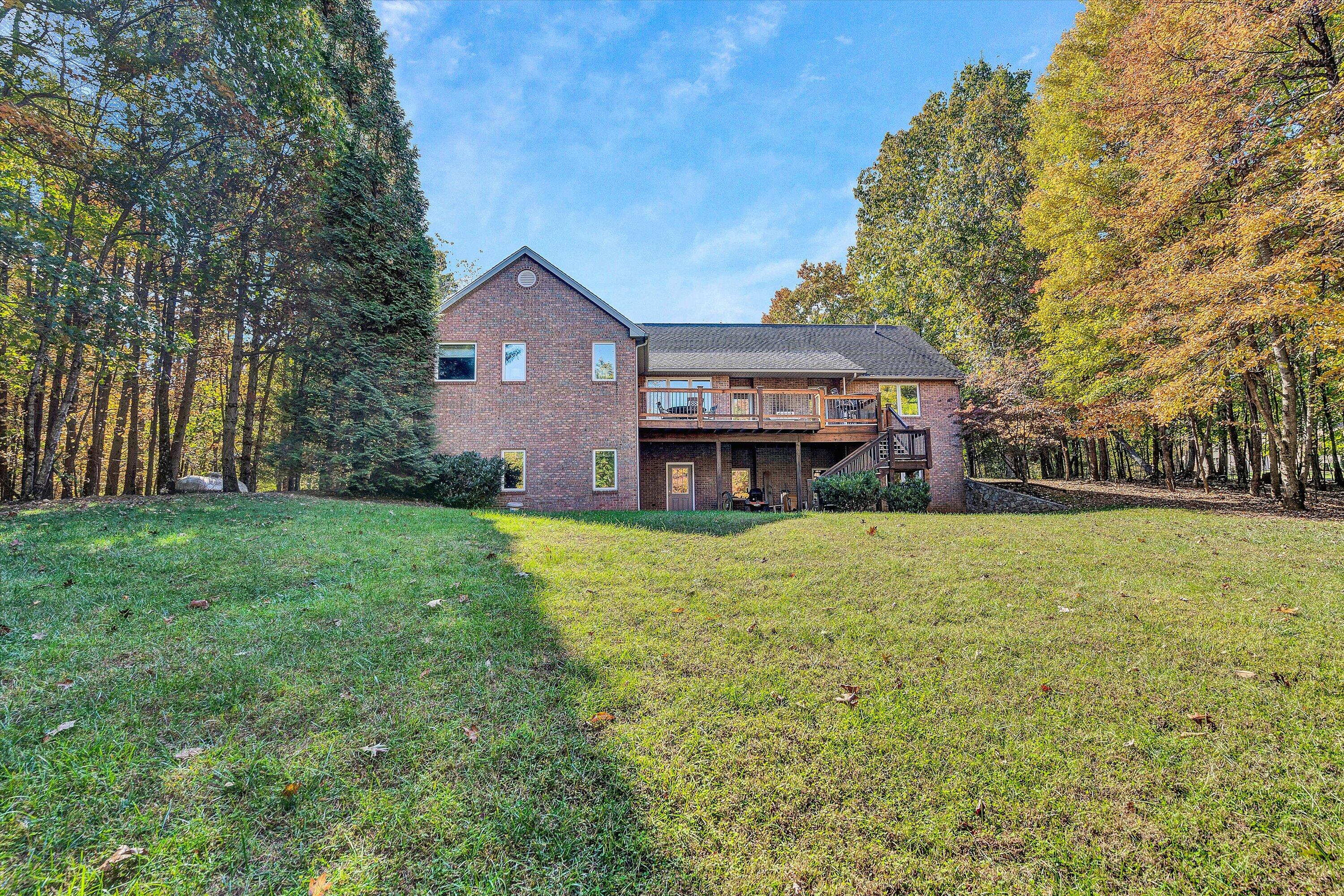 526 Stonebridge Drive Blue Ridge, VA 24064 - Photo 34 of 35 a front view of a house with a yard