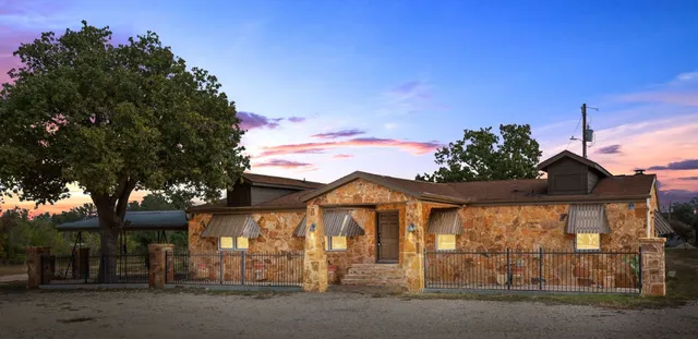 front view of a house with a street