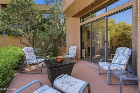 a outdoor living space with furniture and garden view