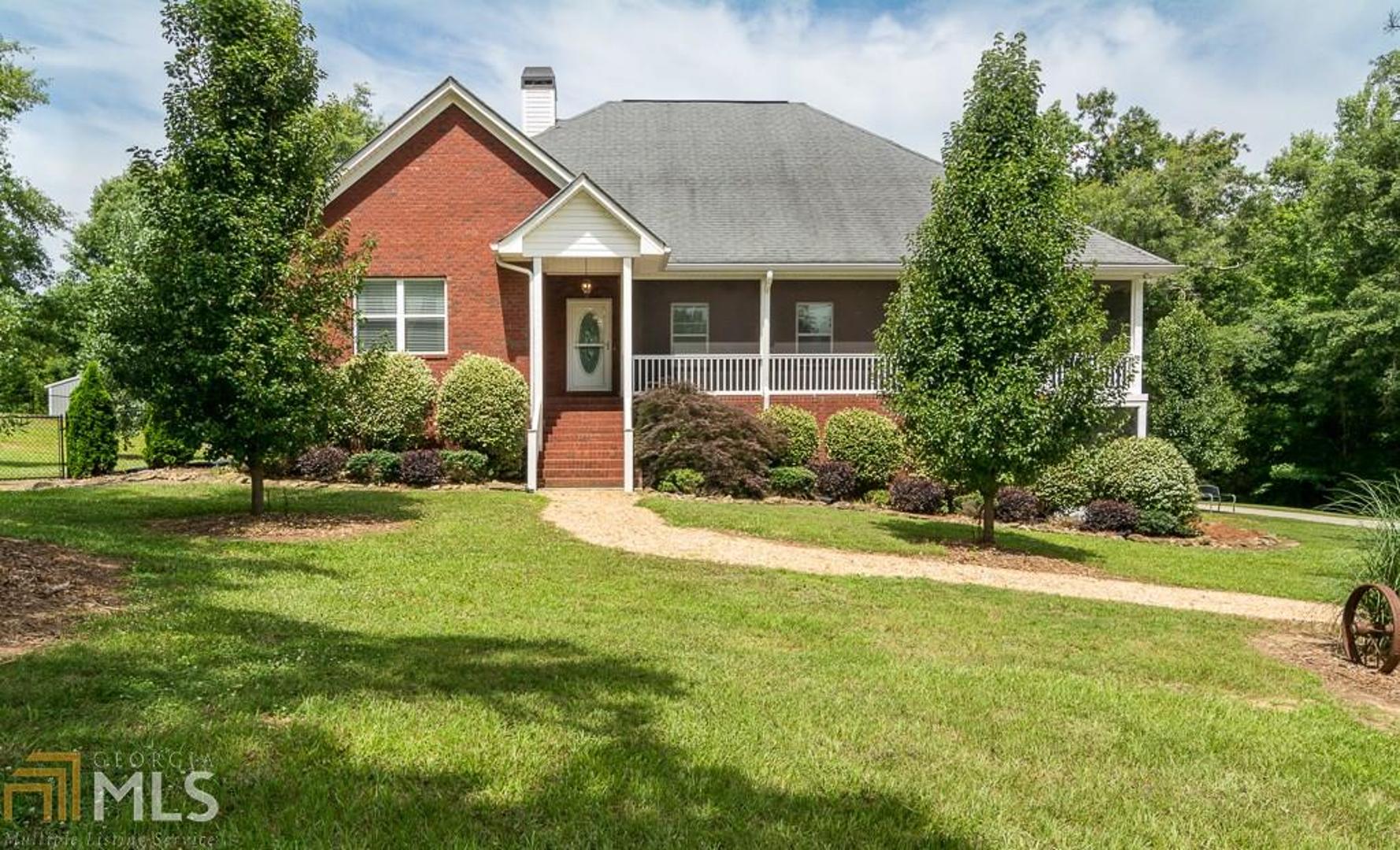 168 Fawn Road Milner, GA 30257 - Photo 1 of 1 a front view of a house with a yard