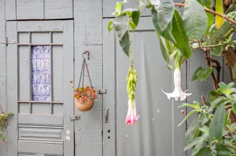 a view of a kitchen cabinets and a stove top oven