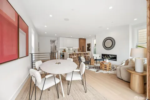 a bedroom with a bed and a lamp