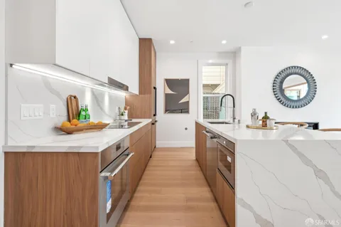 a bed room with a bed and a painting