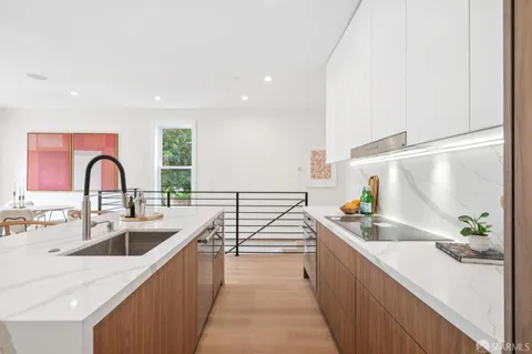 a bedroom with a bed and a chair