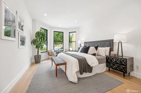 a view of a potted plant next to a window