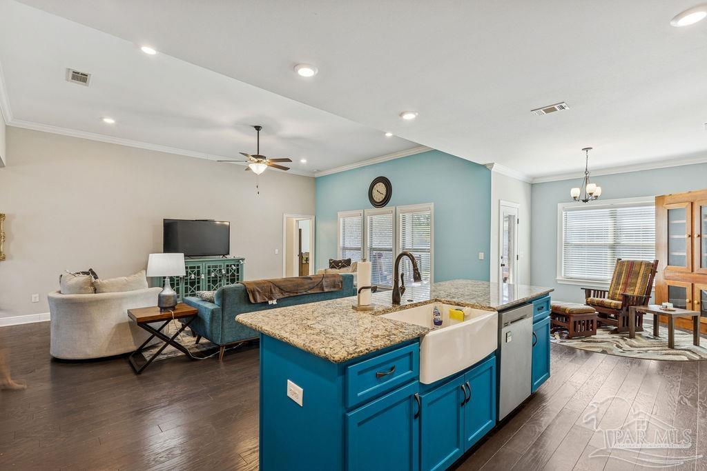 1555 Cadence Loop Cantonment, FL 32533 - Photo 11 of 34 a living room with furniture and a flat screen tv