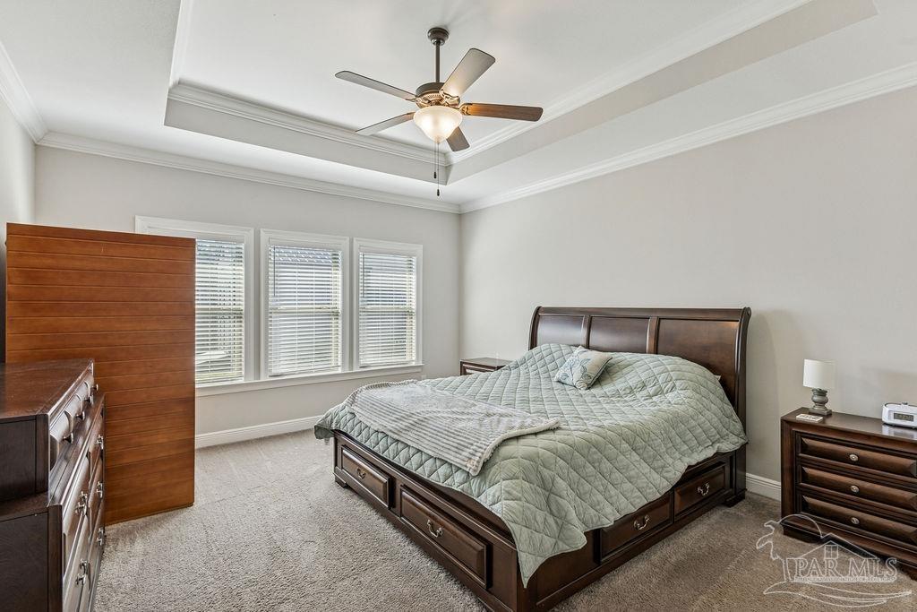 1555 Cadence Loop Cantonment, FL 32533 - Photo 15 of 34 a bedroom with a bed and window