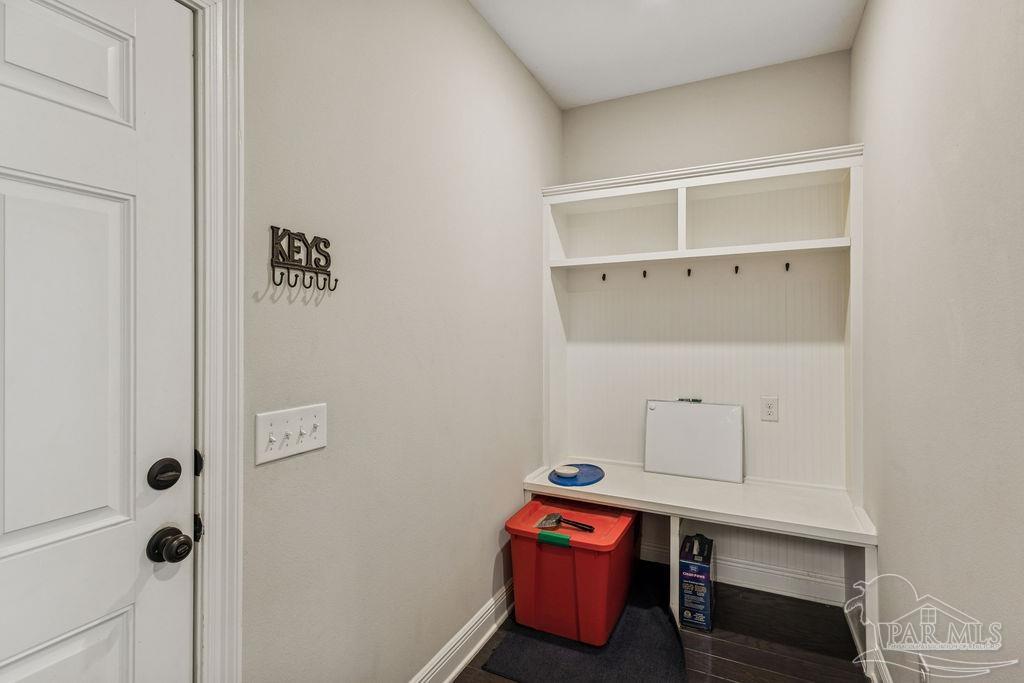 1555 Cadence Loop Cantonment, FL 32533 - Photo 22 of 34 a room with storage and utility room