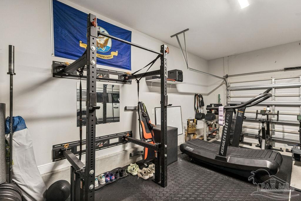 1555 Cadence Loop Cantonment, FL 32533 - Photo 23 of 34 a view of a room with gym equipment
