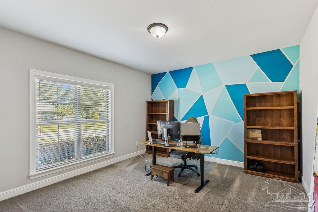 1555 Cadence Loop Cantonment, FL 32533 - Photo 24 of 34 a workspace with furniture and a window
