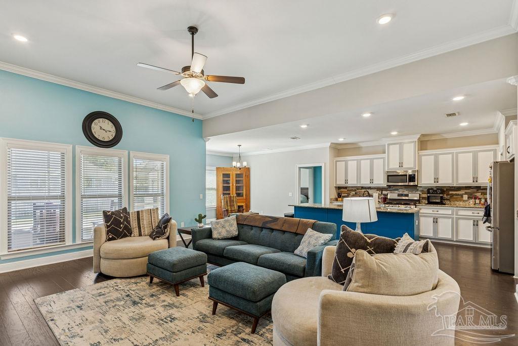 1555 Cadence Loop Cantonment, FL 32533 - Photo 8 of 34 a living room with furniture and kitchen view
