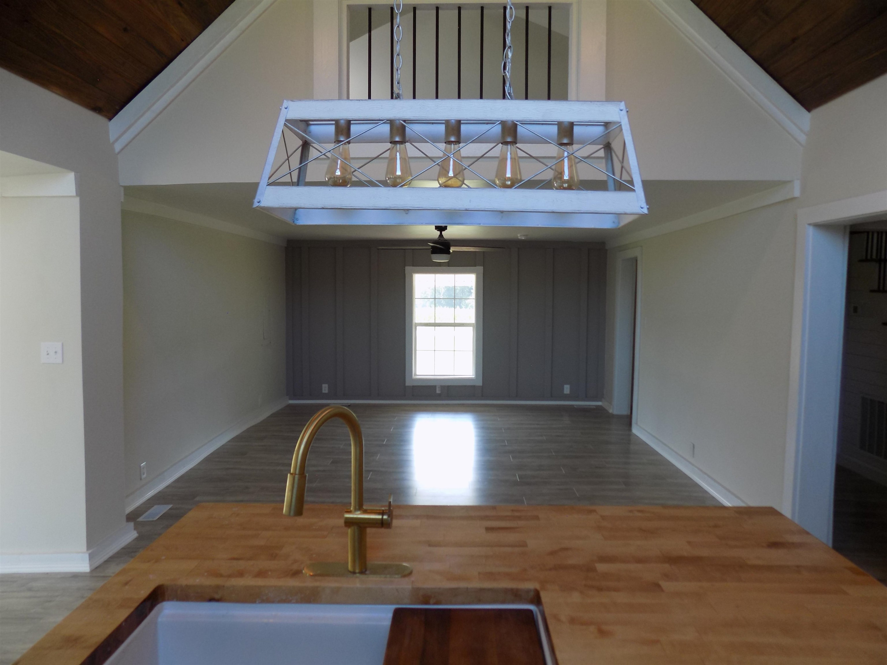 821 Greys Mill Road Louisburg, NC 27549 - Photo 14 of 33 a view of a sink a window and an entryway