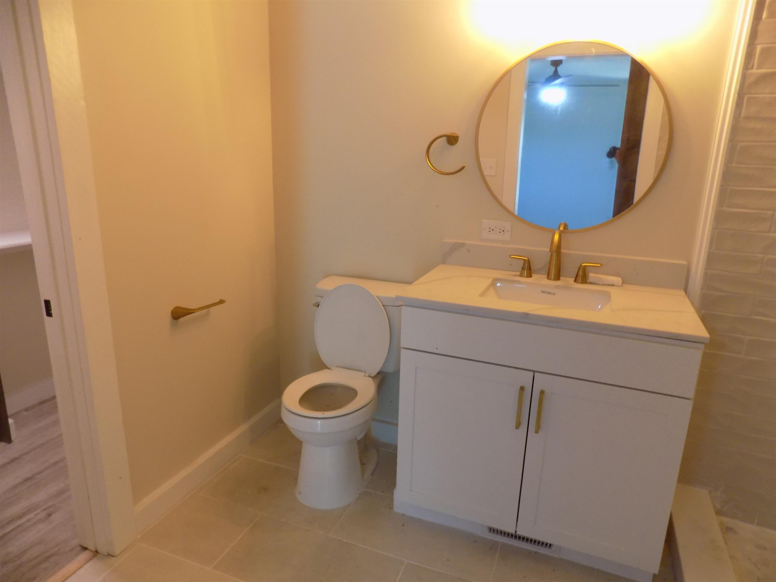 821 Greys Mill Road Louisburg, NC 27549 - Photo 20 of 33 a bathroom with a sink and a mirror