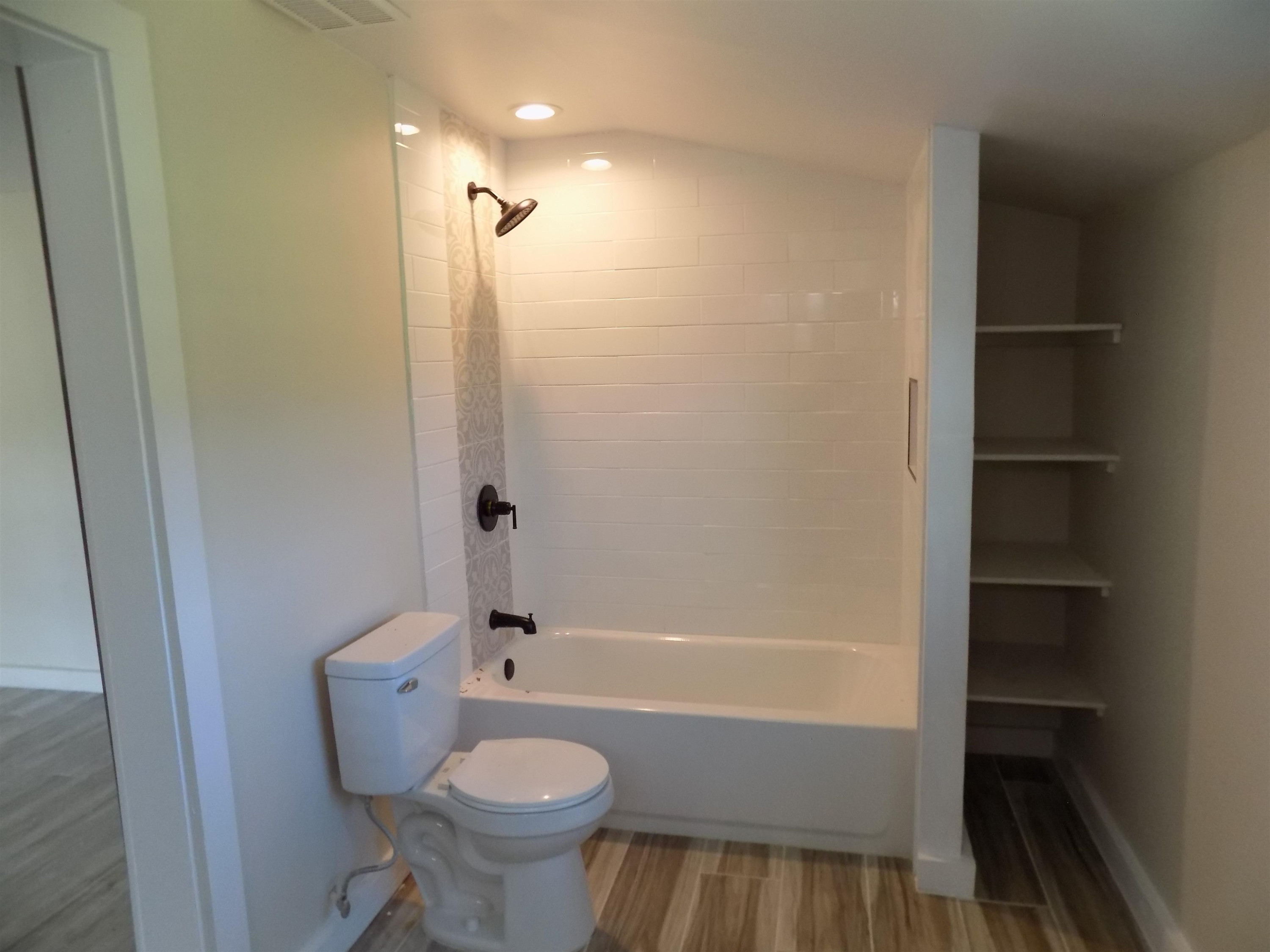 821 Greys Mill Road Louisburg, NC 27549 - Photo 24 of 33 a bathroom with a sink toilet and shower