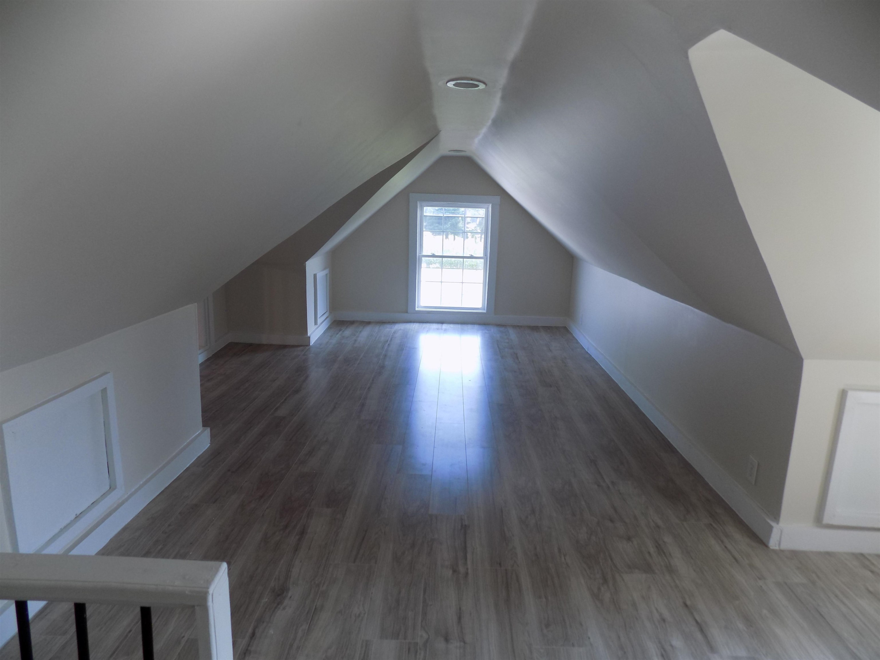821 Greys Mill Road Louisburg, NC 27549 - Photo 31 of 33 a view of hallway with wooden floor