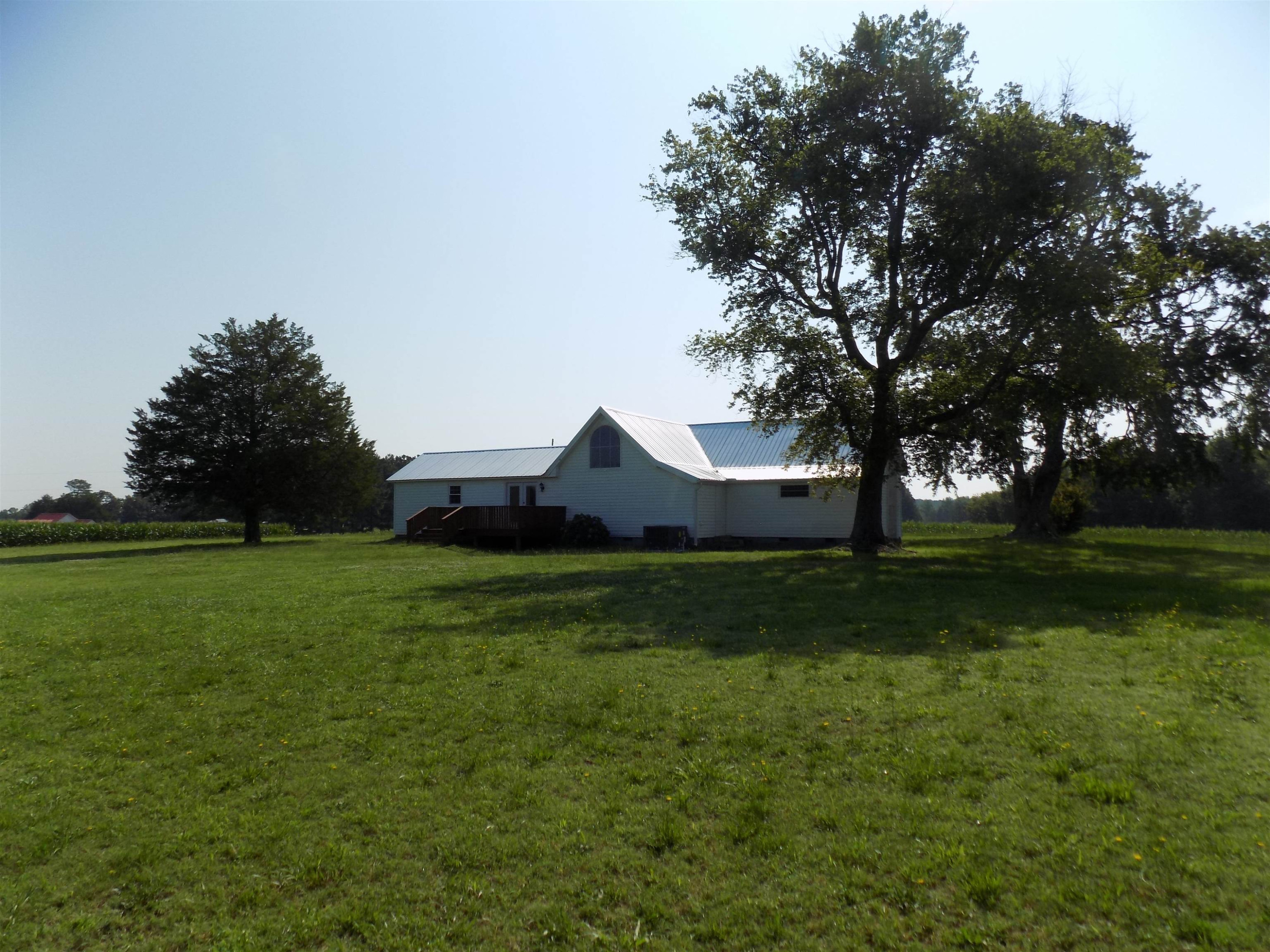 821 Greys Mill Road Louisburg, NC 27549 - Photo 6 of 33 a view of house with a big yard