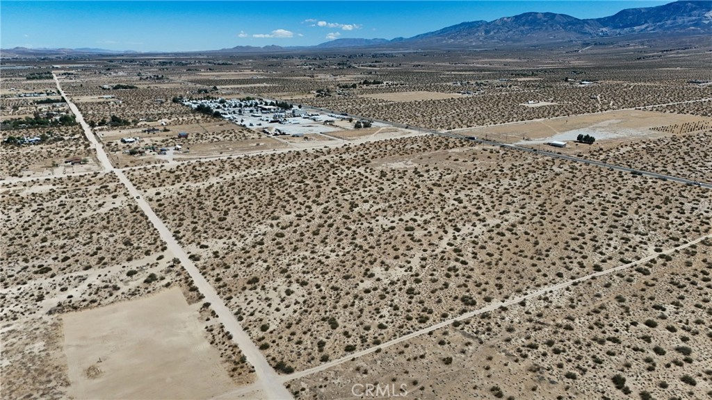 731 Sunset Road Lucerne Valley, CA 92356 - Photo 3 of 8 Red boundary lines on pictures are an estimate and for marketing purposes only. Buyer to verify all aspects of this property including, but not limited to utilities, assessments, boundaries, usage, access, and zoning to satisfy themselves.