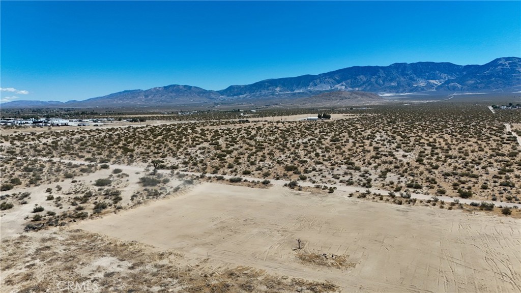 731 Sunset Road Lucerne Valley, CA 92356 - Photo 4 of 8 Red boundary lines on pictures are an estimate and for marketing purposes only. Buyer to verify all aspects of this property including, but not limited to utilities, assessments, boundaries, usage, access, and zoning to satisfy themselves.