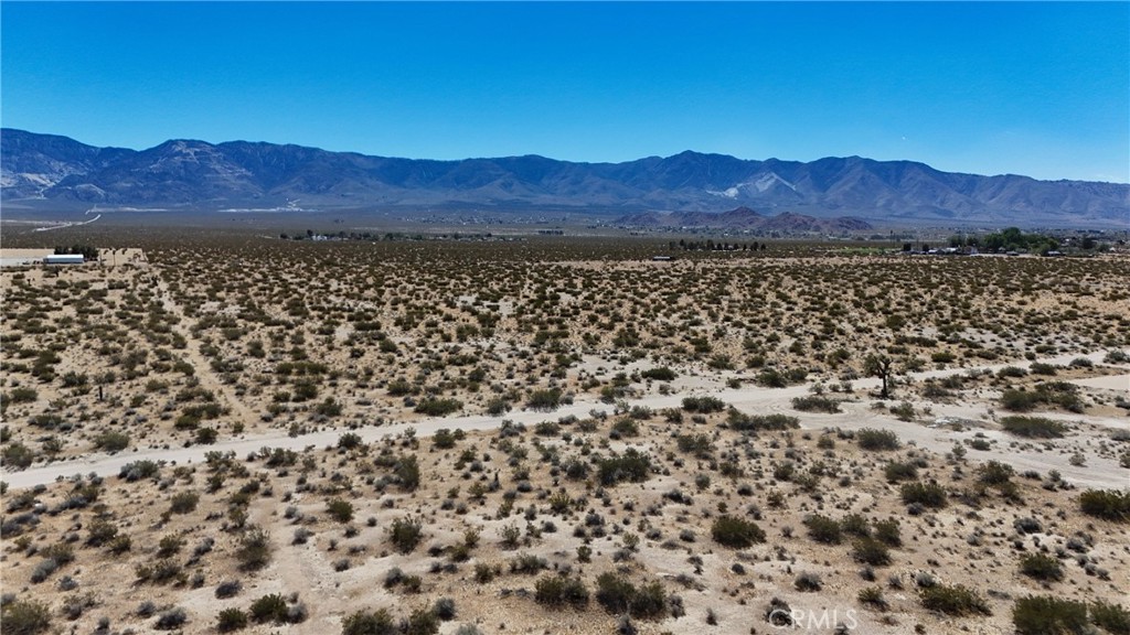 731 Sunset Road Lucerne Valley, CA 92356 - Photo 5 of 8 Red boundary lines on pictures are an estimate and for marketing purposes only. Buyer to verify all aspects of this property including, but not limited to utilities, assessments, boundaries, usage, access, and zoning to satisfy themselves.