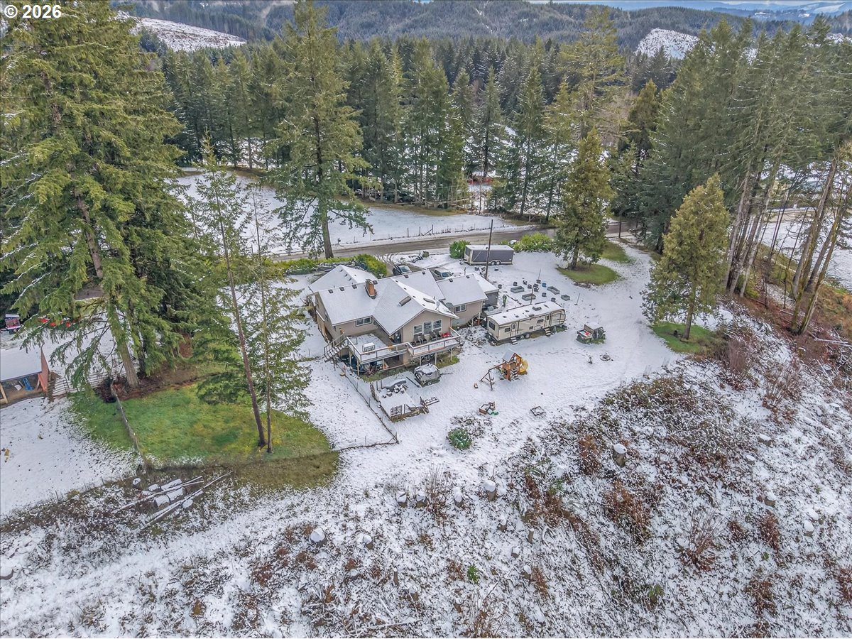 26875 Northwest Bacona Road Buxton, OR 97109 - Photo 15 of 43 a view of a yard with large trees