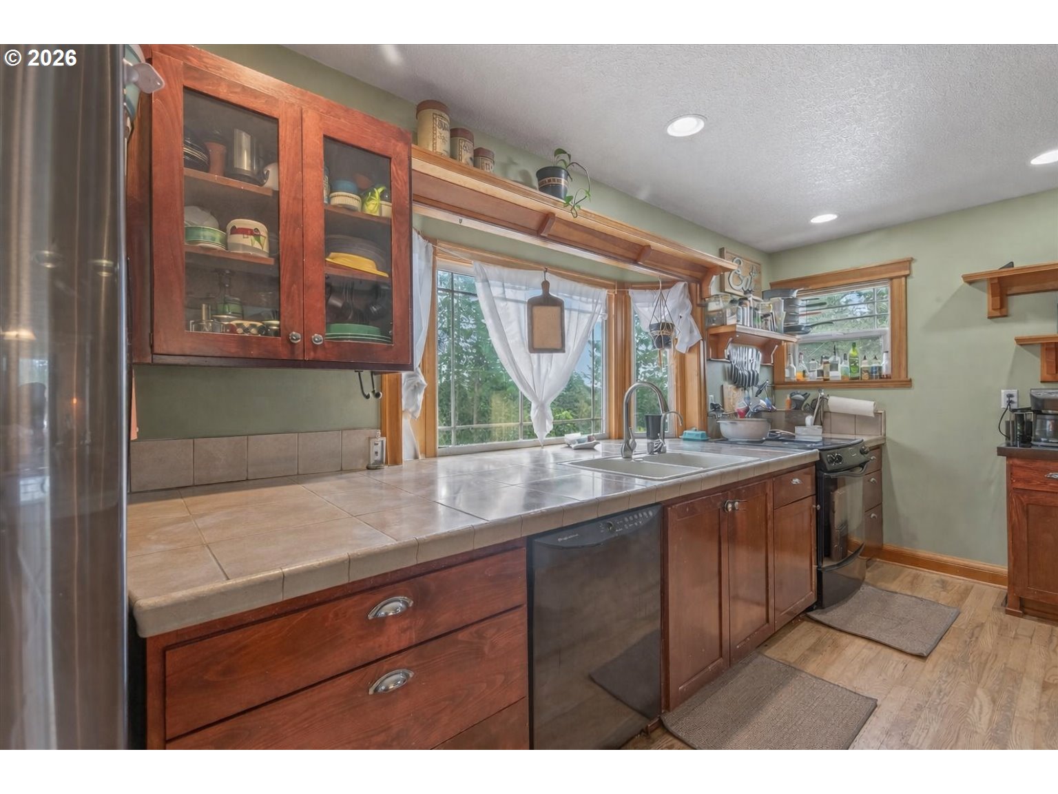 26875 Northwest Bacona Road Buxton, OR 97109 - Photo 21 of 43 a kitchen with a sink and large window