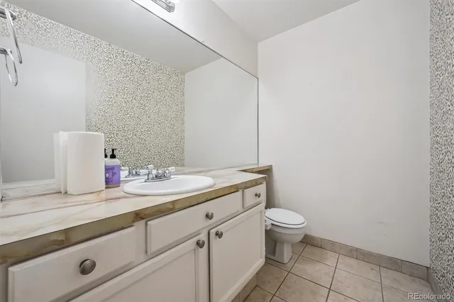 a view of an entryway with wooden floor and windows