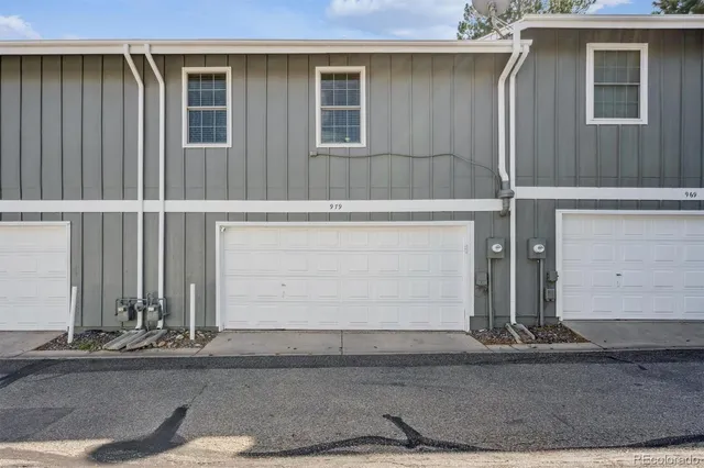 a view of a house with a big yard