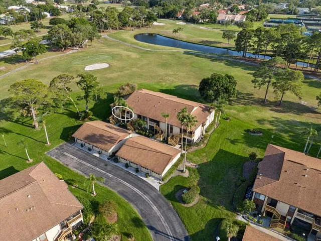 an aerial view of a house with a garden