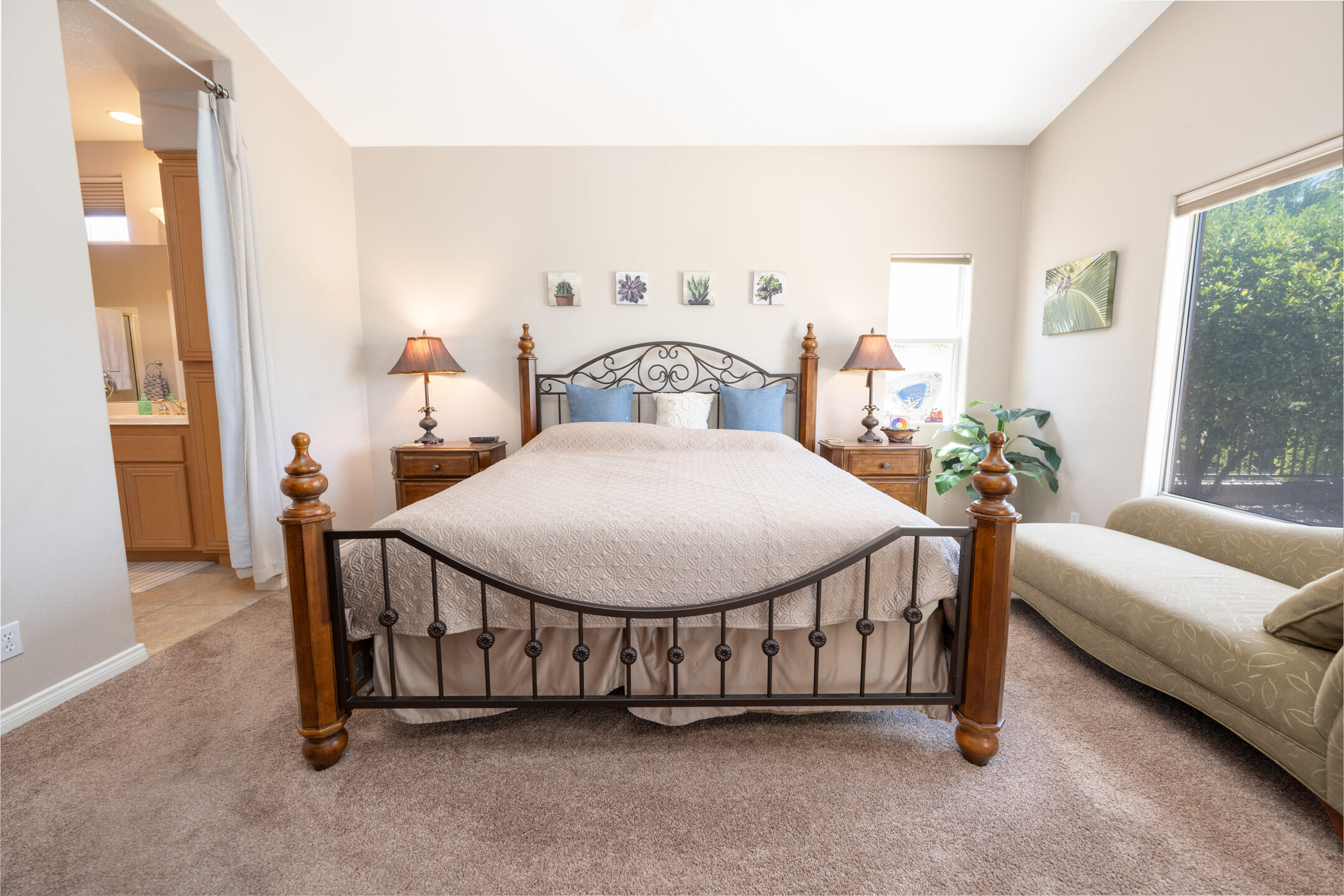 45233 Big Canyon Street Indio, CA 92201 - Photo 13 of 43 a view of a bedroom with furniture and a window