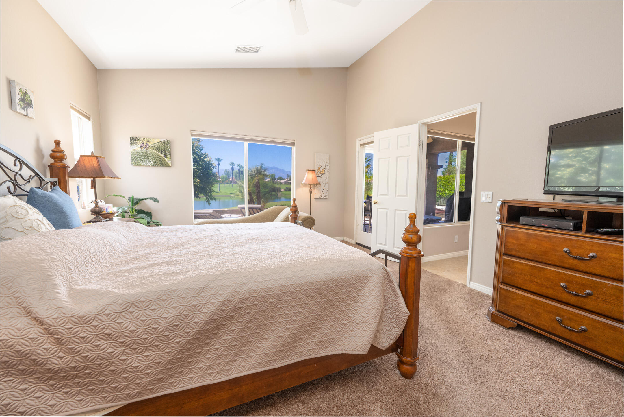 45233 Big Canyon Street Indio, CA 92201 - Photo 14 of 43 a bedroom with a bed and furniture