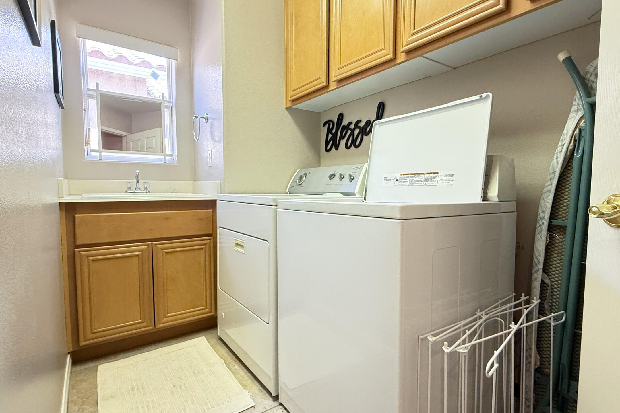 45233 Big Canyon Street Indio, CA 92201 - Photo 21 of 43 a utility room with dryer and washer