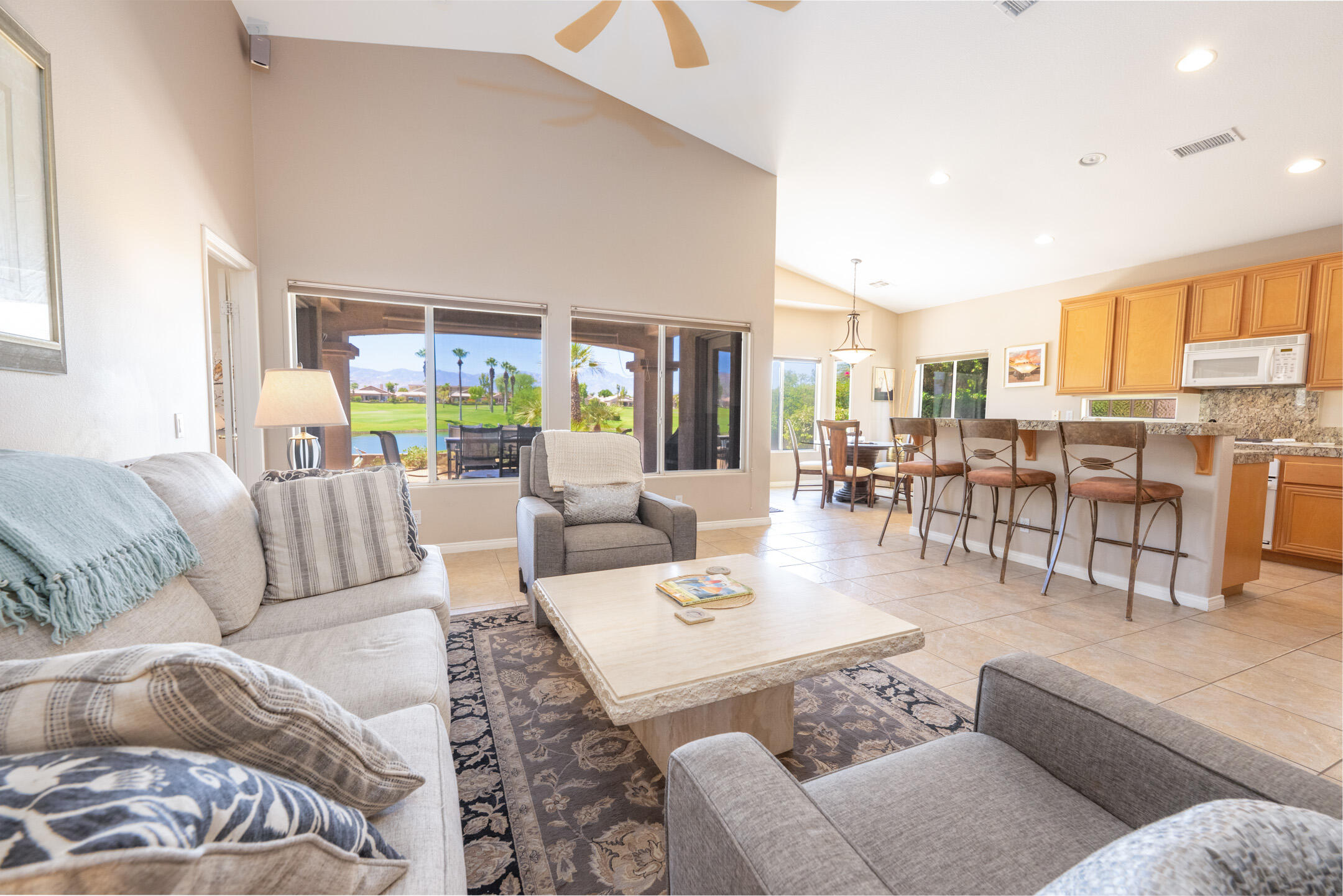45233 Big Canyon Street Indio, CA 92201 - Photo 6 of 43 a living room with furniture and a large window