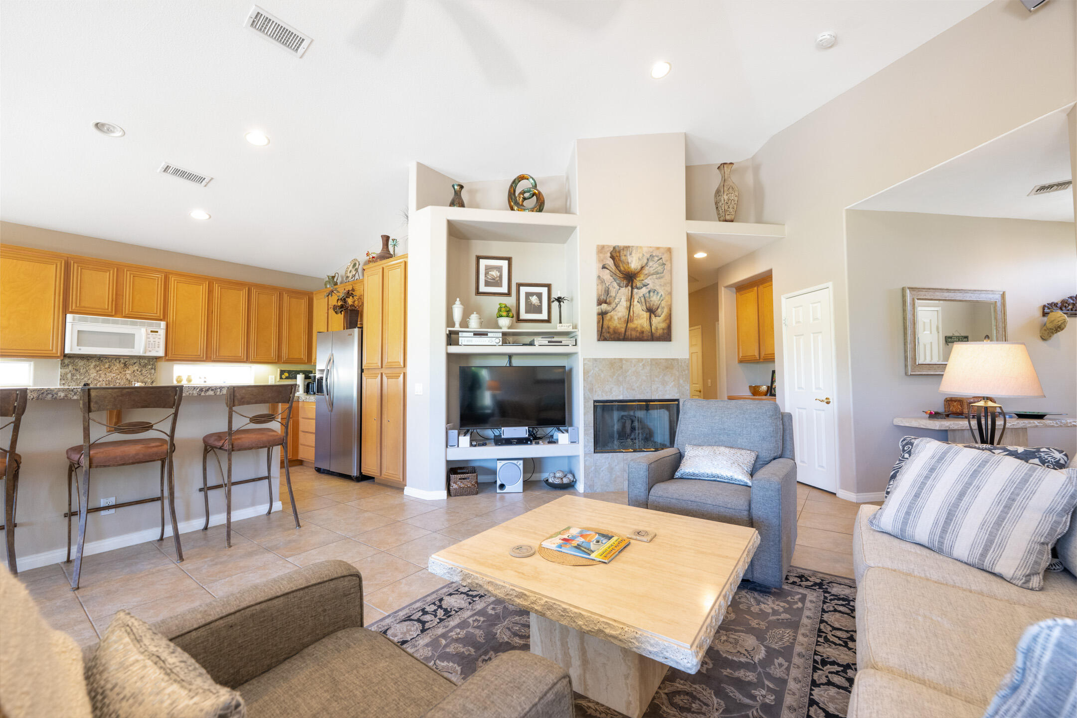 45233 Big Canyon Street Indio, CA 92201 - Photo 10 of 43 a living room with furniture and a flat screen tv