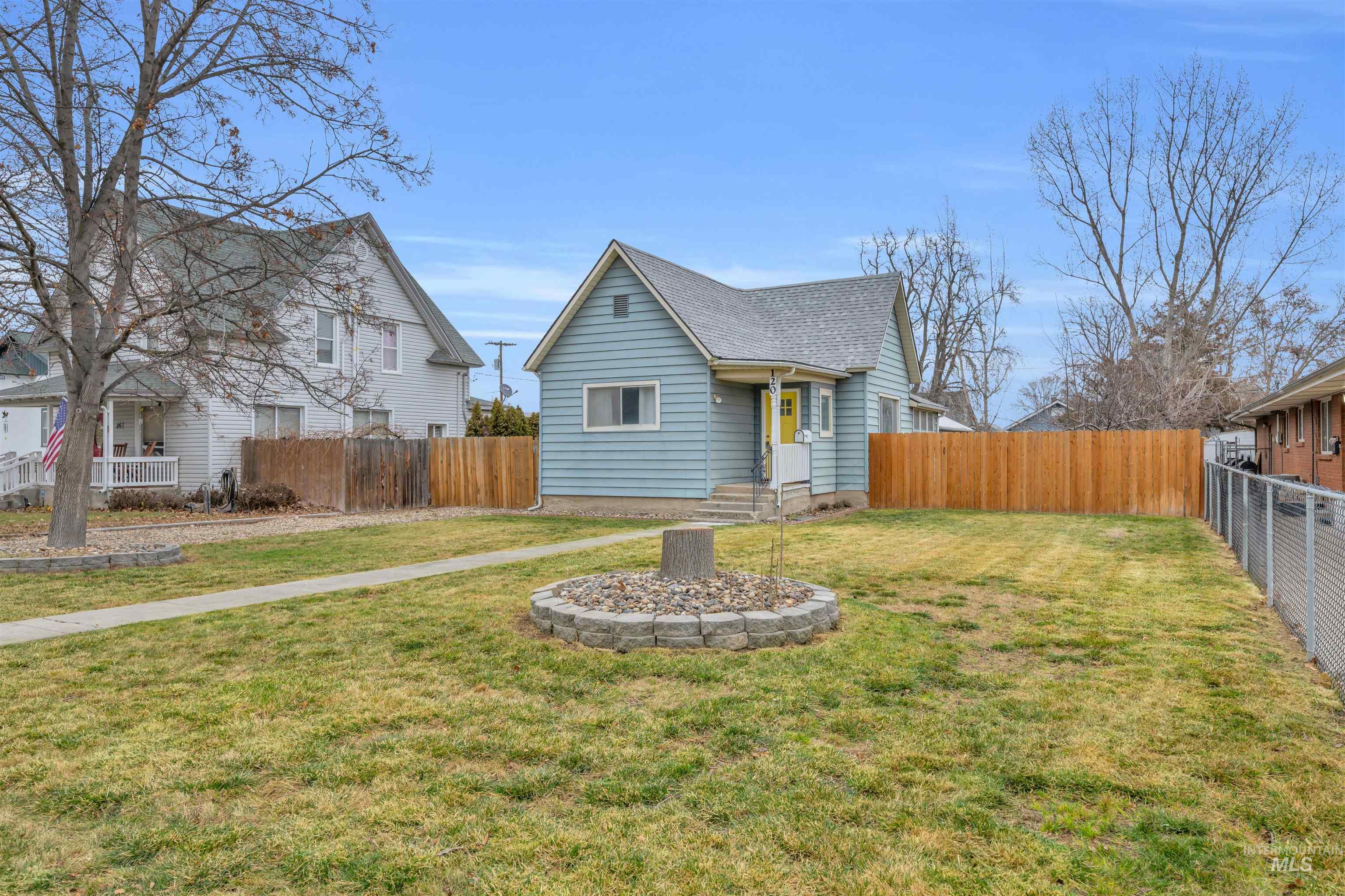 120 South Locust Street Nampa, ID 83686 - Photo 2 of 32 View of front of property with a shingled roof