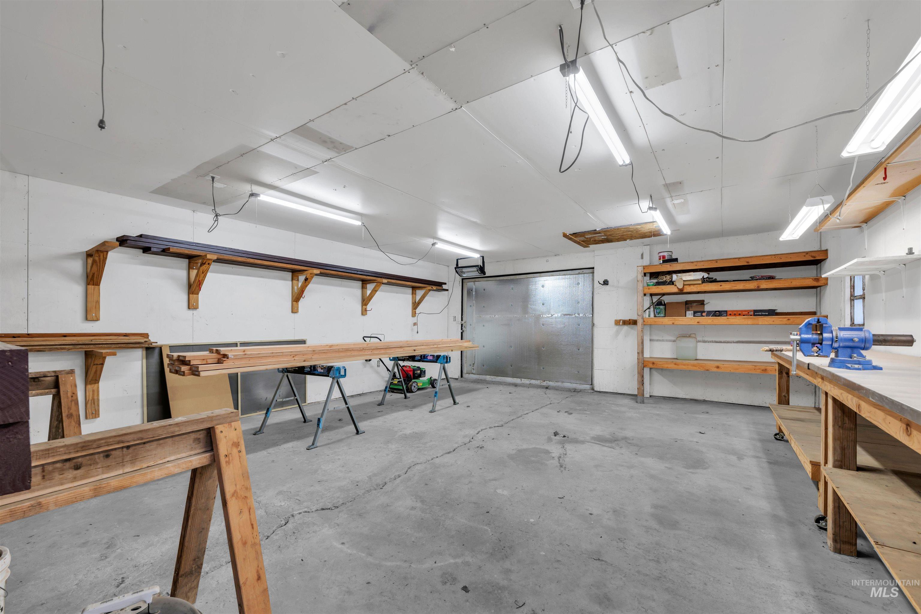 120 South Locust Street Nampa, ID 83686 - Photo 28 of 32 Miscellaneous room with a workshop area and unfinished concrete floors