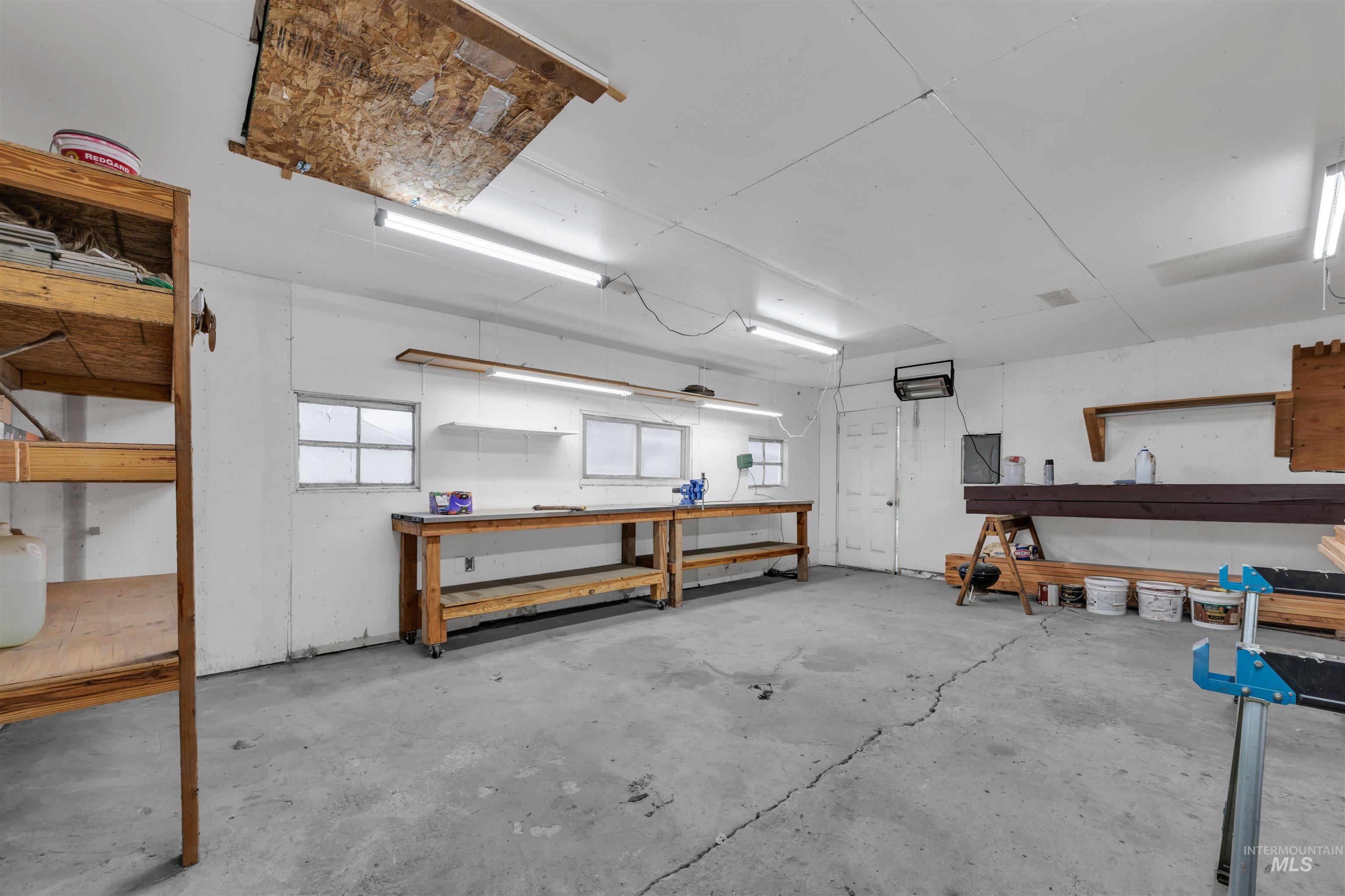 120 South Locust Street Nampa, ID 83686 - Photo 29 of 32 Misc room with a workshop area and concrete flooring