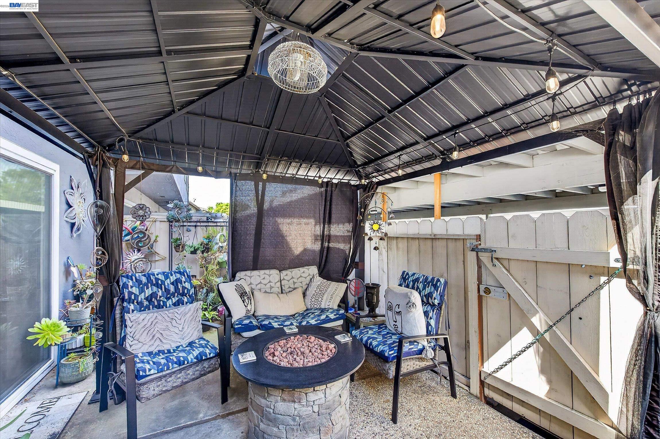 4416 Comanche Way Pleasanton, CA 94588 - Photo 19 of 24 a view of a chairs and table in a patio