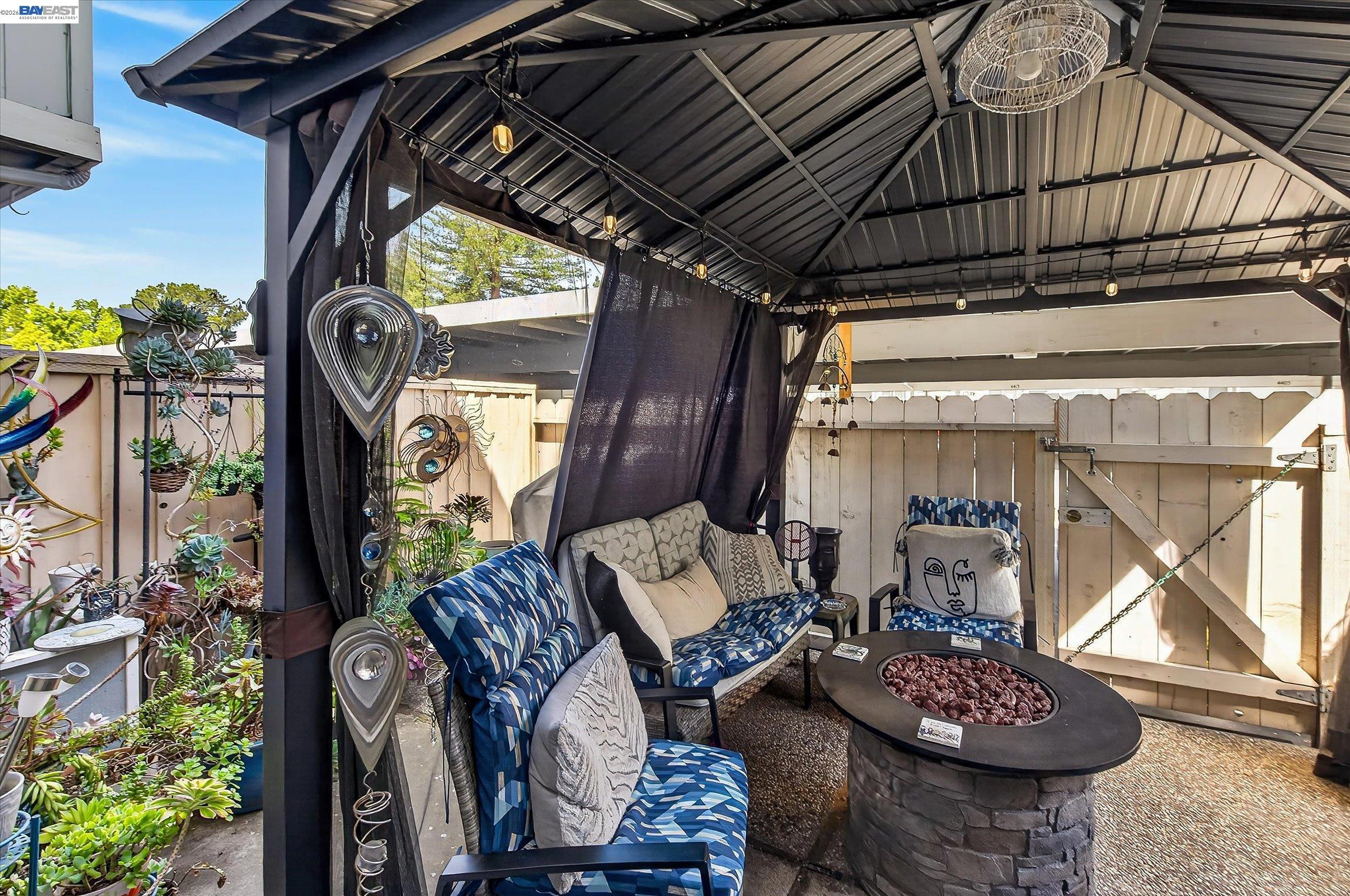 4416 Comanche Way Pleasanton, CA 94588 - Photo 20 of 24 a view of porch with furniture and a floor to ceiling window