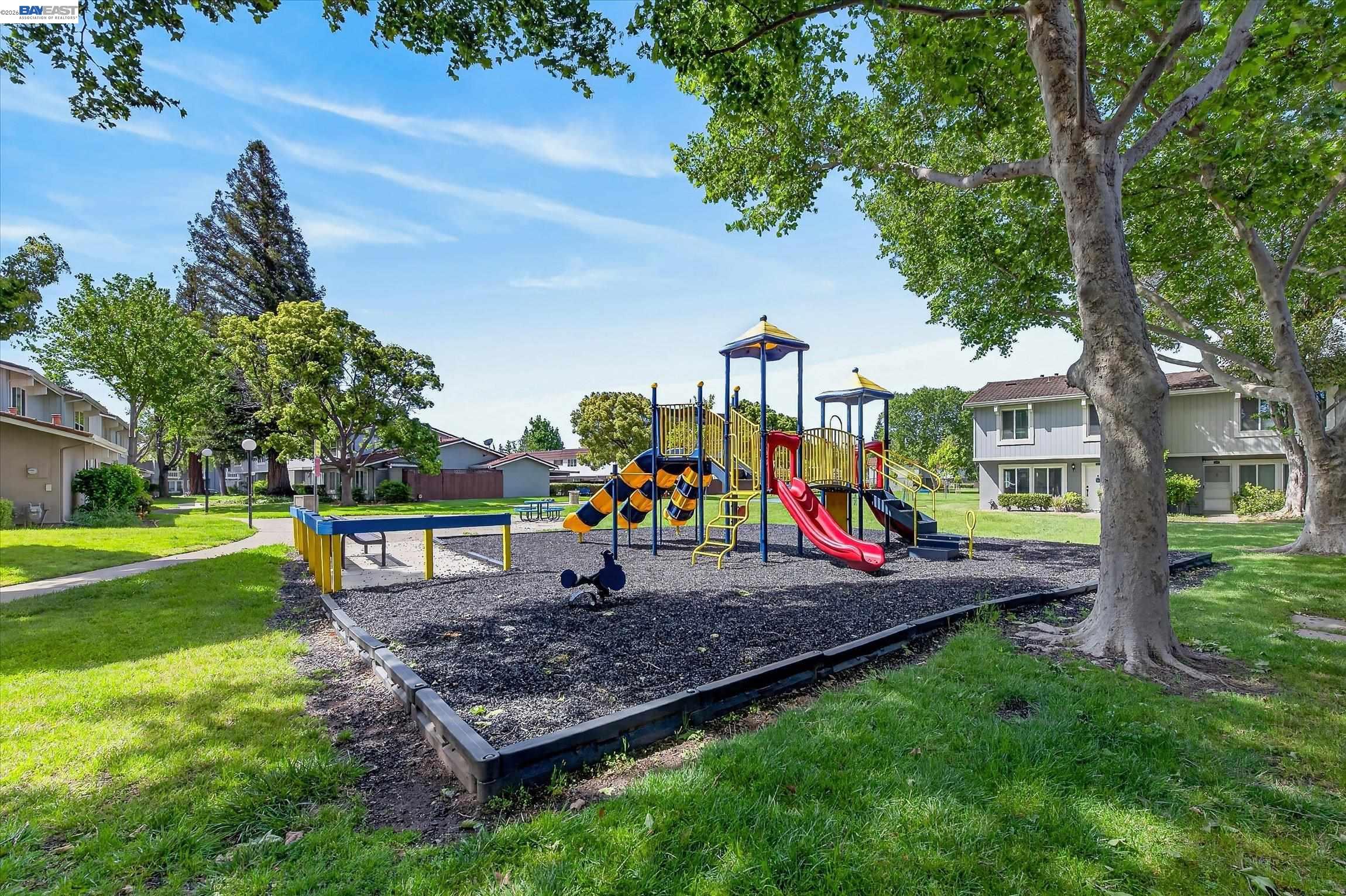 4416 Comanche Way Pleasanton, CA 94588 - Photo 21 of 24 a view of a park with plants and a bench