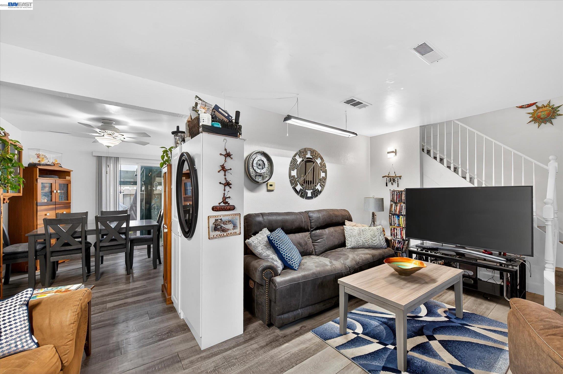 4416 Comanche Way Pleasanton, CA 94588 - Photo 6 of 24 a living room with furniture and a flat screen tv