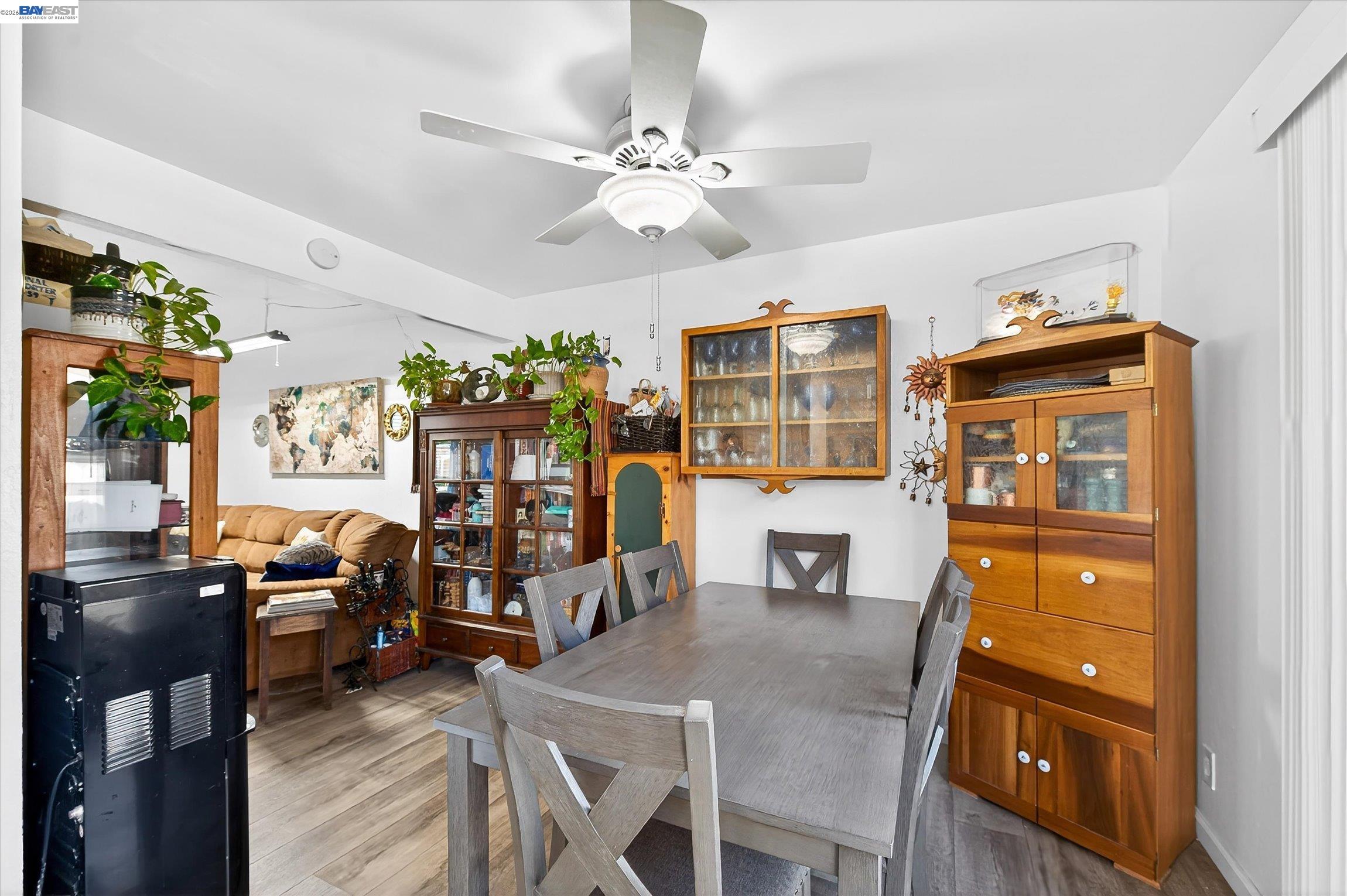 4416 Comanche Way Pleasanton, CA 94588 - Photo 7 of 24 a view of a dining room with furniture and chandelier