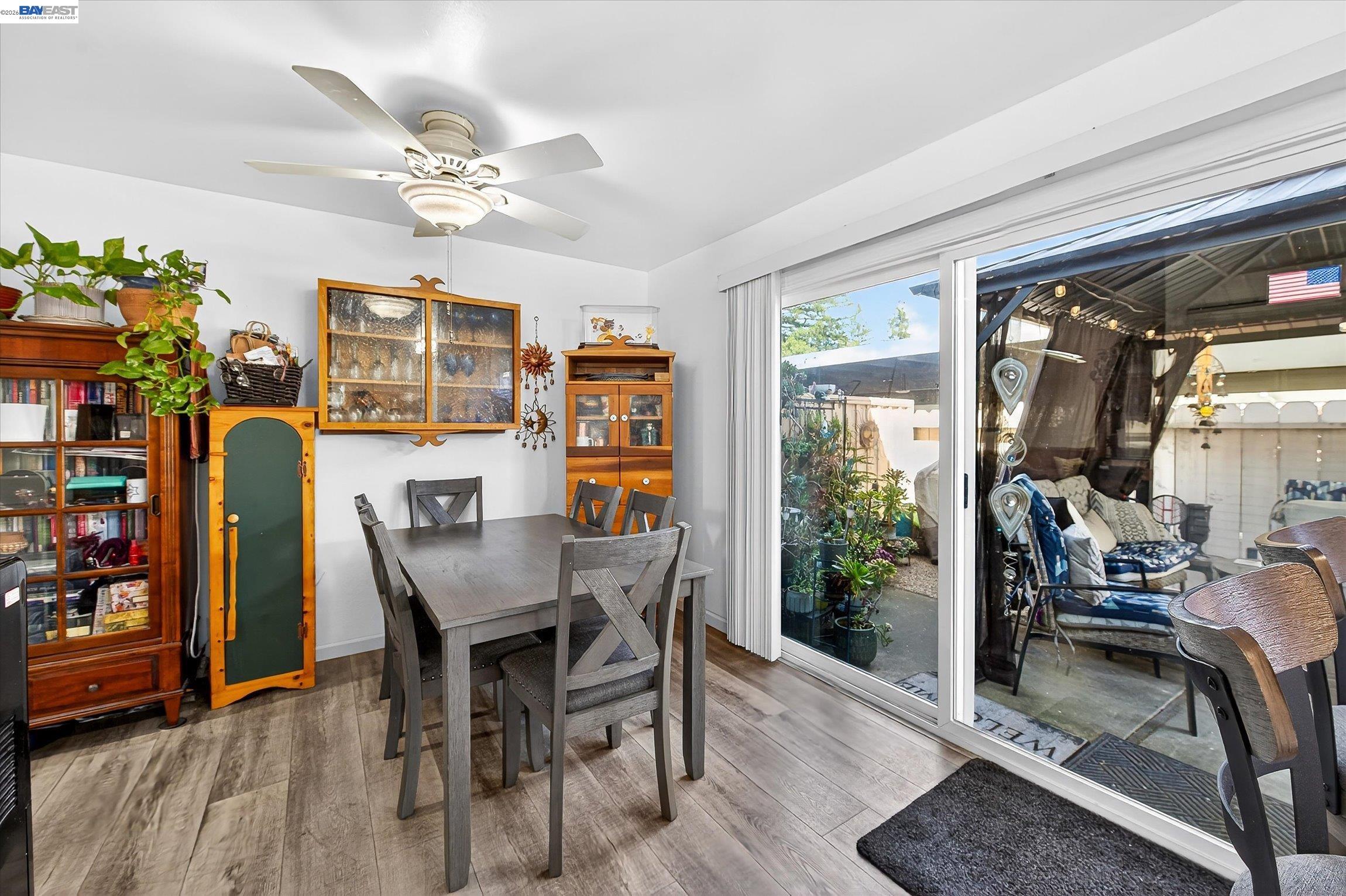 4416 Comanche Way Pleasanton, CA 94588 - Photo 8 of 24 a view of a dining room with furniture window and wooden floor