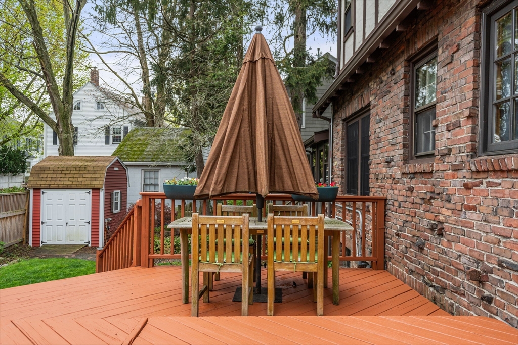 138 Albemarle Road Newton, MA 02460 - Photo 23 of 34 a view of a chairs and table in the patio