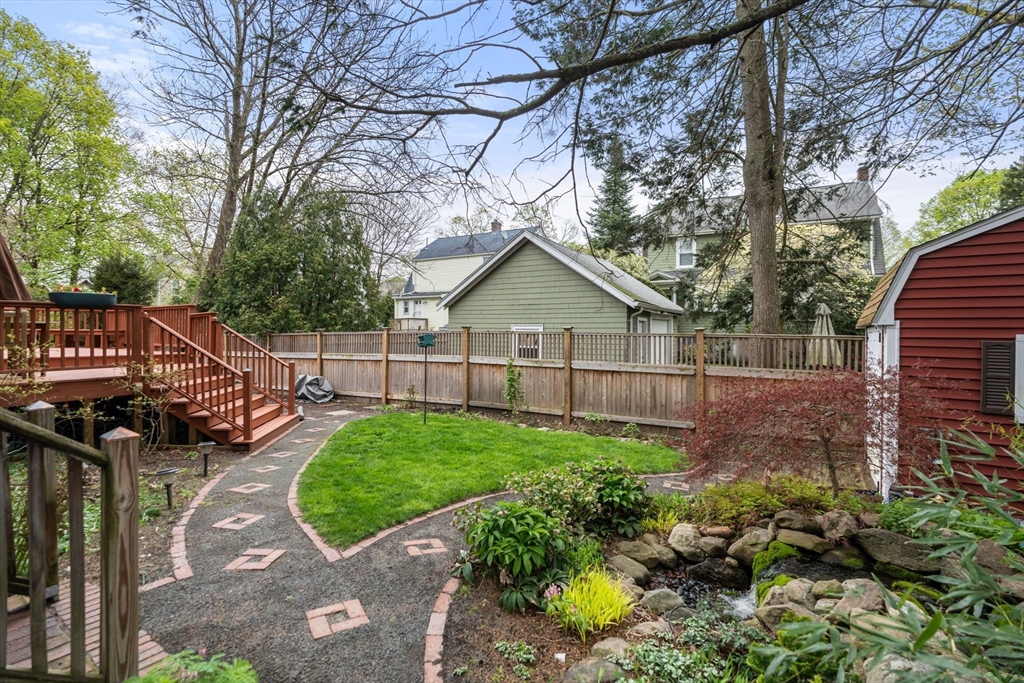 138 Albemarle Road Newton, MA 02460 - Photo 26 of 34 a view of a house with backyard and sitting area