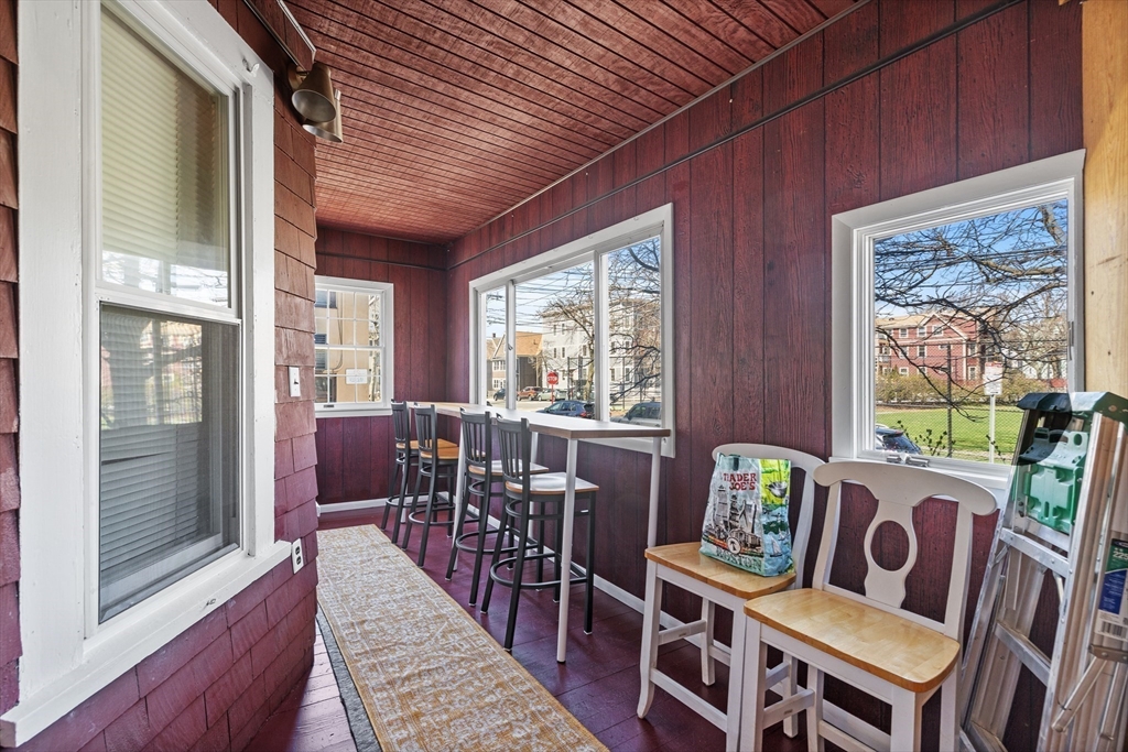 7 Simpson Avenue Somerville, MA 02144 - Photo 20 of 36 a view of a dining room with furniture window and outside view