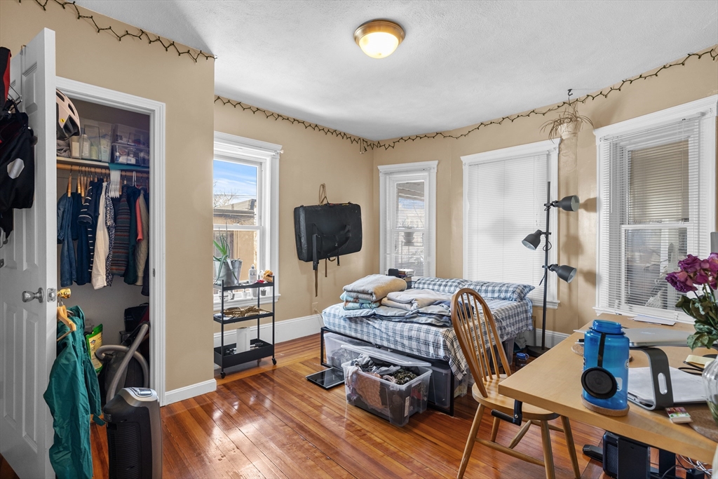 7 Simpson Avenue Somerville, MA 02144 - Photo 26 of 36 a living room with furniture and a flat screen tv