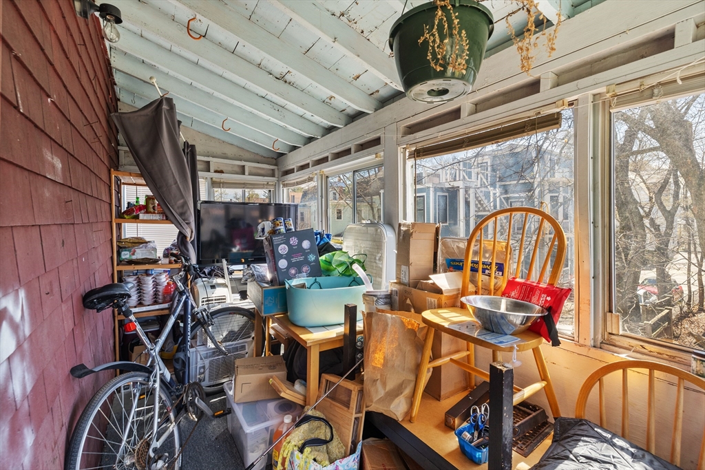 7 Simpson Avenue Somerville, MA 02144 - Photo 33 of 36 a view of a dining room with furniture window and outside view