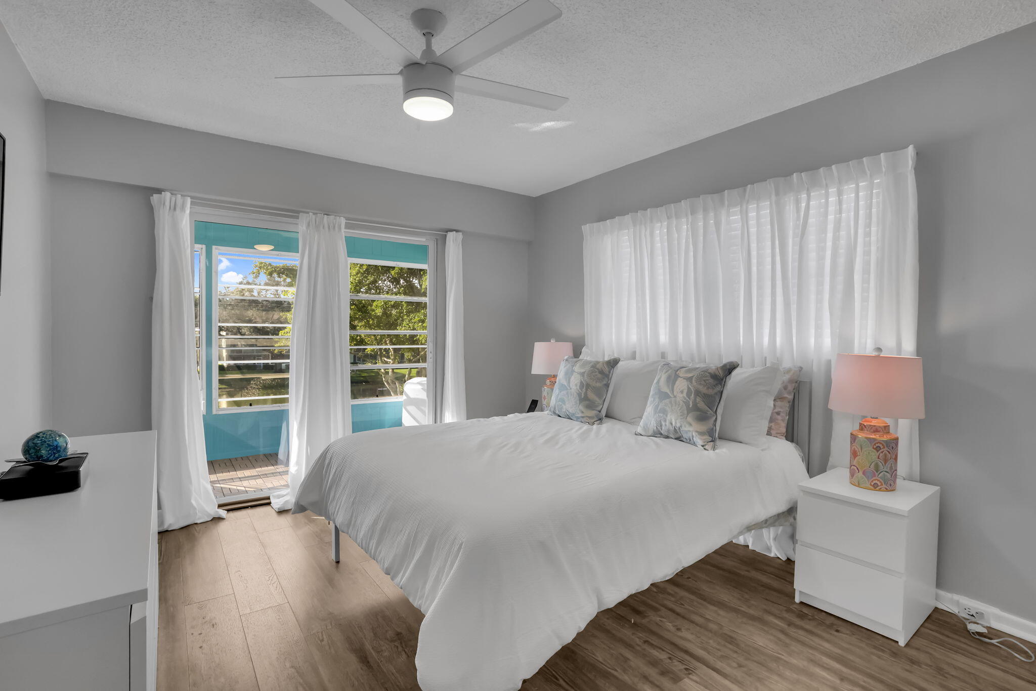 336 Dorset H Boca Raton, FL 33434 - Photo 12 of 31 a bedroom with a large bed and a window
